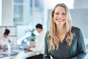 A young female at work smiling